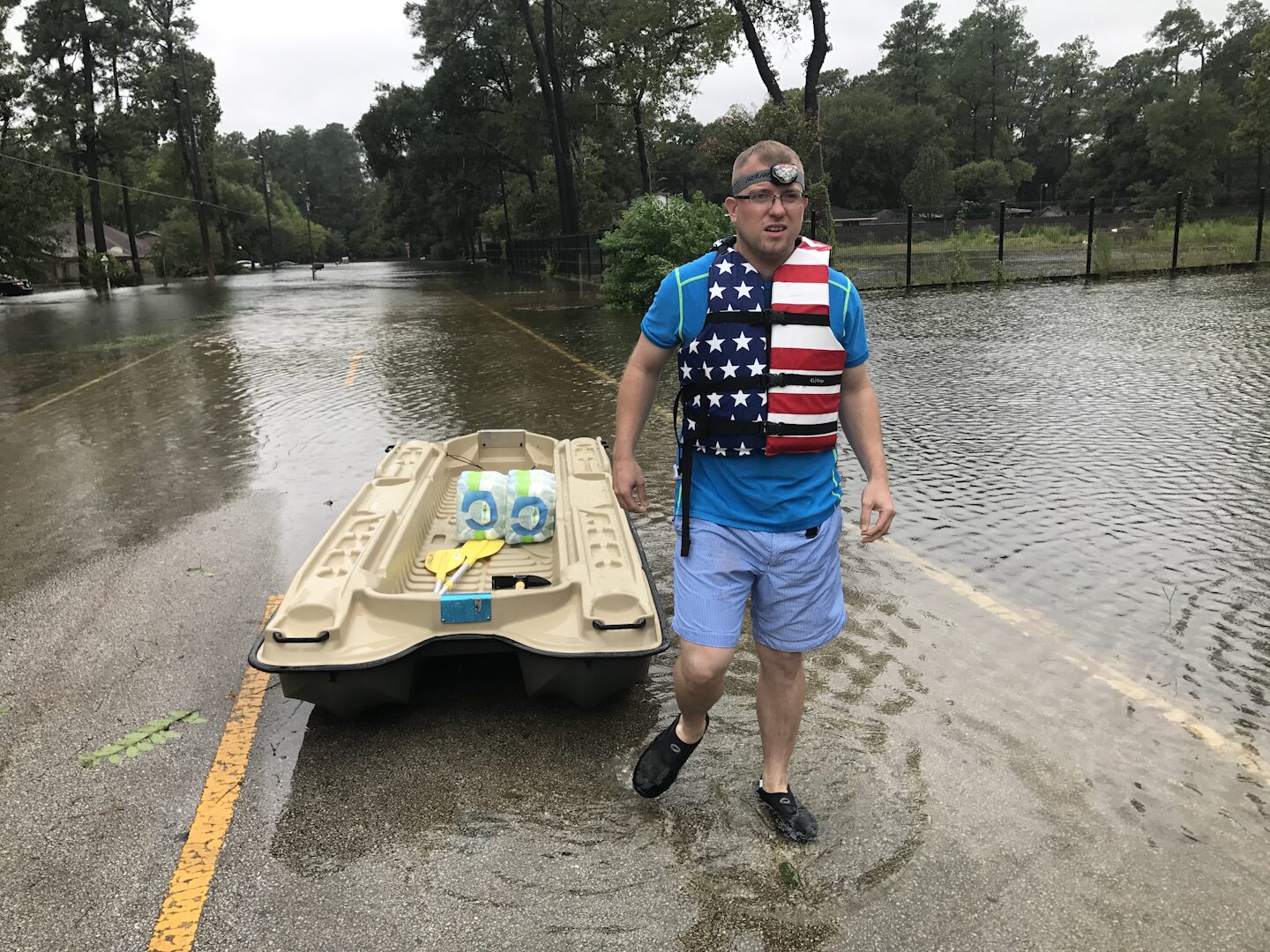 Ryan Nichols search and rescue — boat rescue in floodwater after a hurricane
