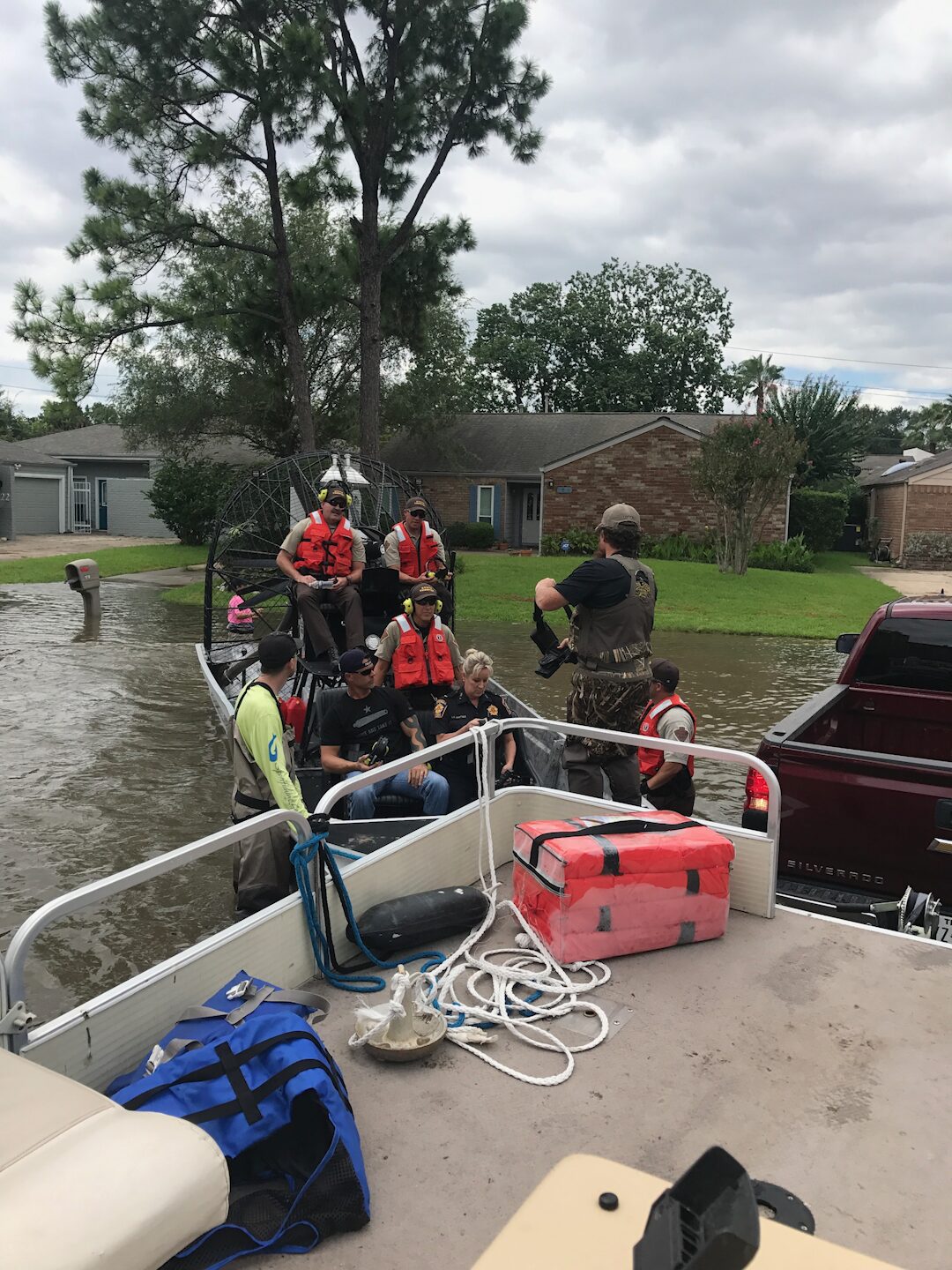 Disaster relief — Ryan Nichols delivering supplies to a flooded community