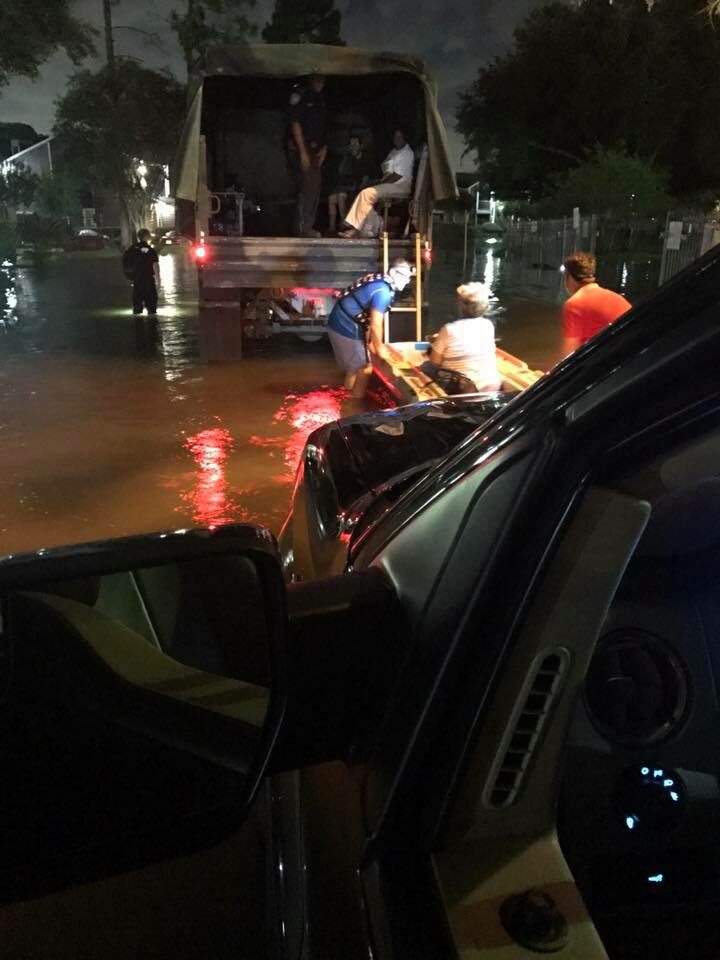 Rescue the Universe volunteers evacuating families from rising floodwater