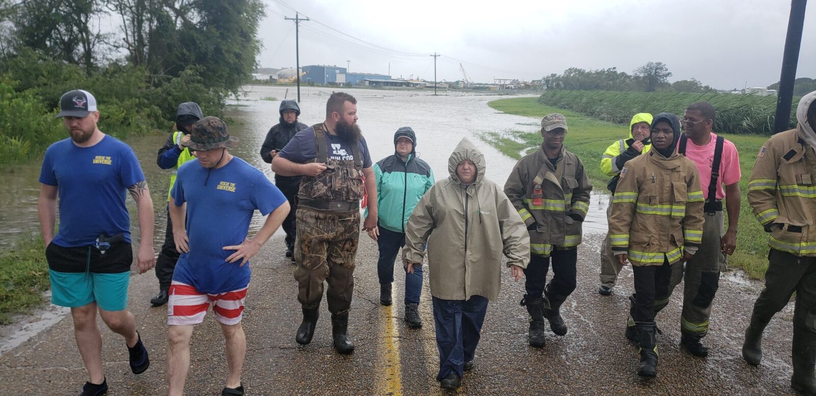 Rescue the Universe volunteers evacuating families from rising floodwater